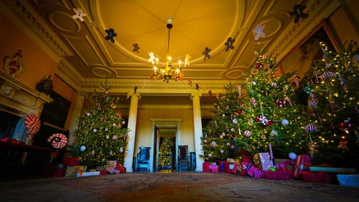 Spectacular Christmas entrance at Ormesby Hall with large trees and decorations